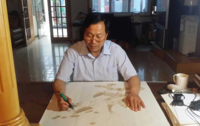 周玖林——中宣盛世国际书画院研究员、著名书画家